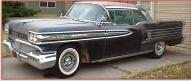 1958 Oldsmobile Ninty Eight 98  Holiday 2 door hardtop with J-2 options left front view