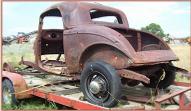 1934 Ford 3 Window Coupe - All Steel Body left rear view